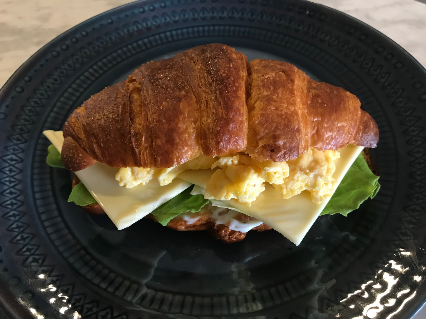 Croissant Sandwich With Scrambled Egg and Cheese